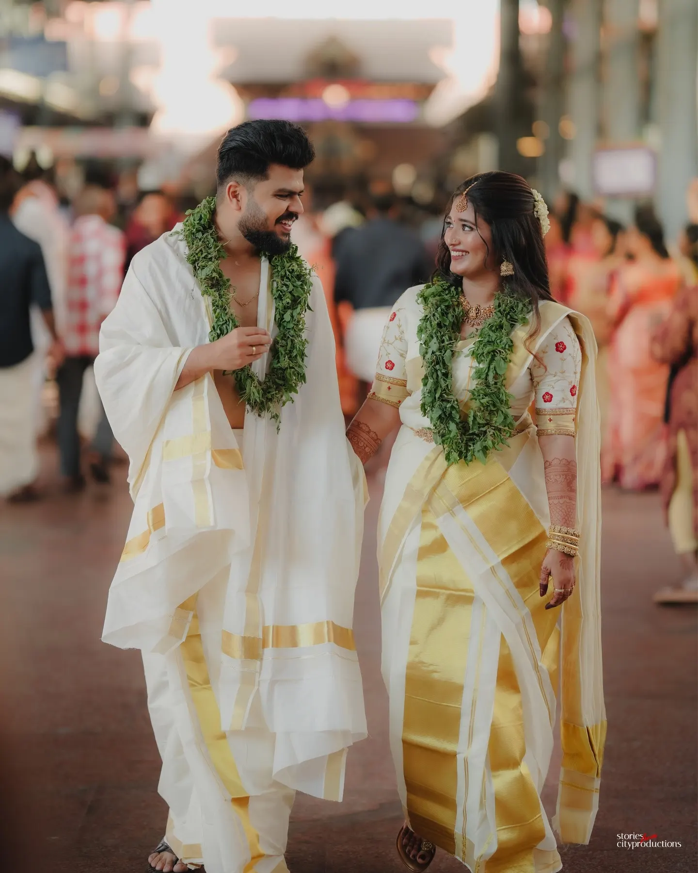 Kerala newlyweds walking together after their ceremony